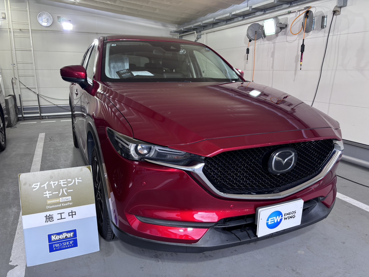 赤いマツダ/CX-5へダイヤモンドキーパーを施工した後のツヤのあるボディ