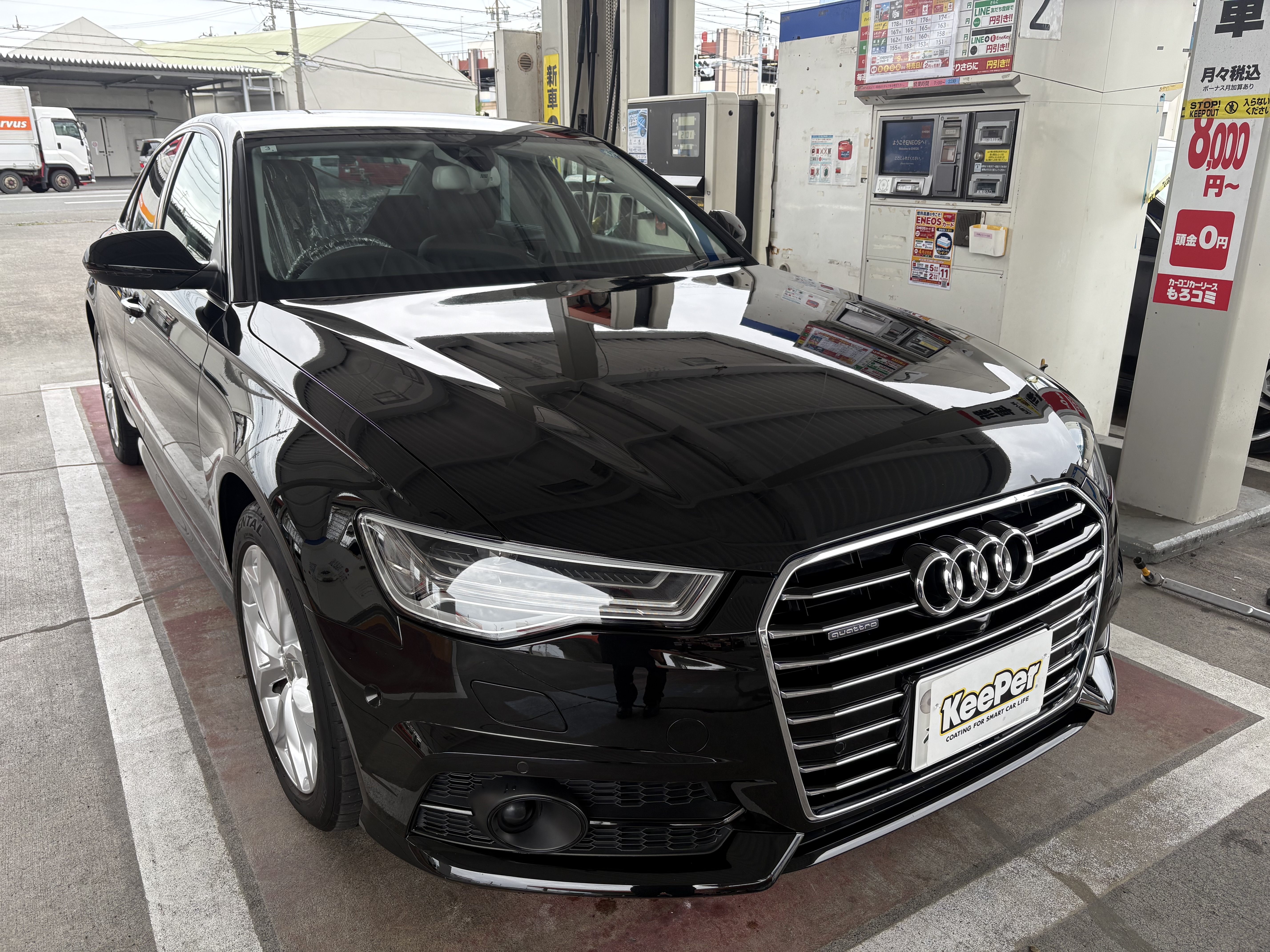 黒いアウディ/A6にダイヤ IIキーパーを施工した後のツヤのあるボディ