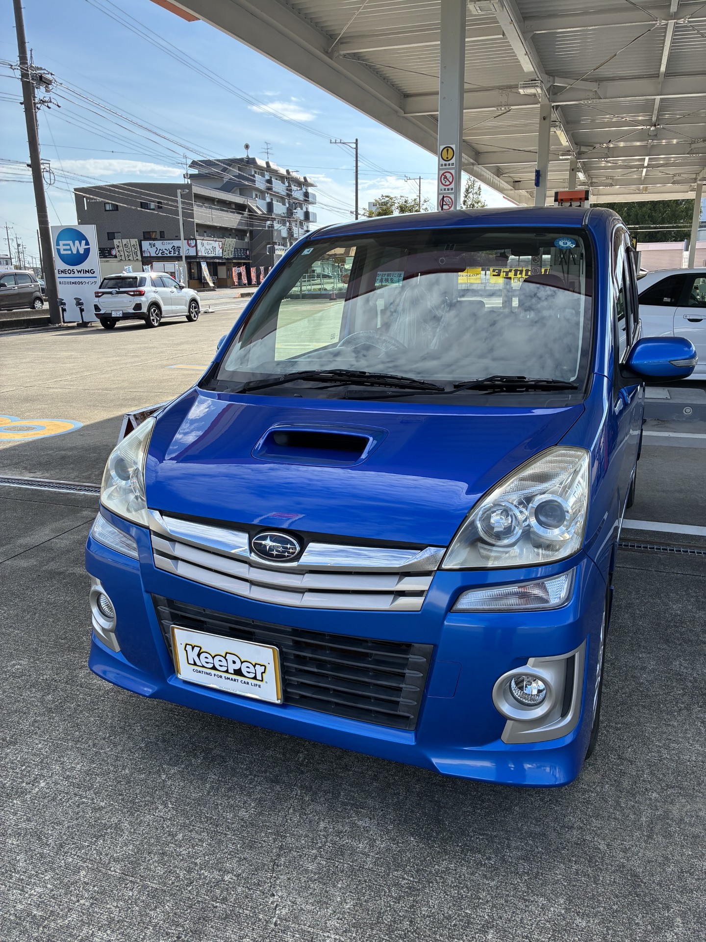 青色のスバル　ステラ　ボンネット、天井、リアスポイラー板金塗装した後に、クリスタルキーパーを施工。