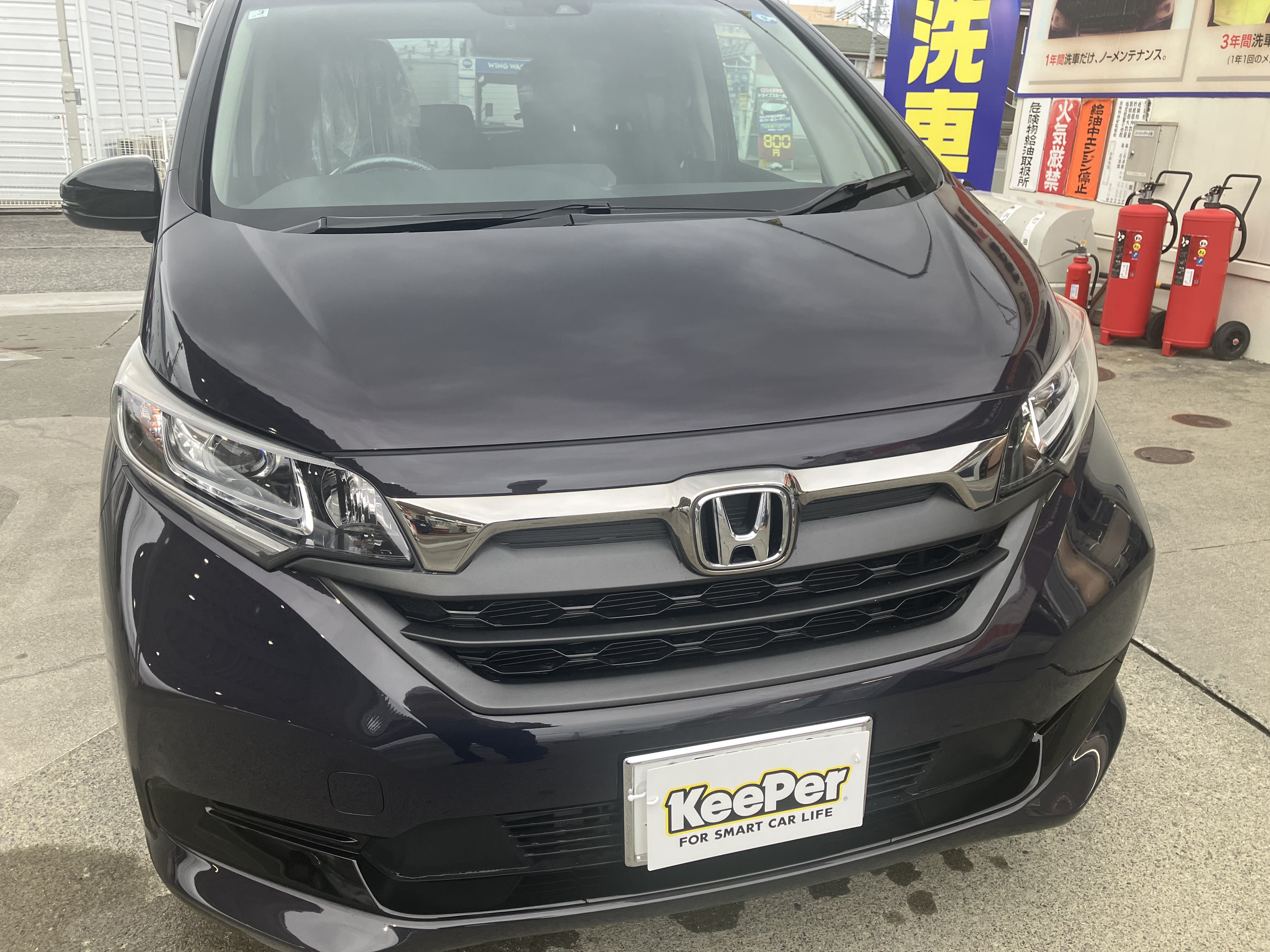 佐久市でフレッシュキーパー施工のフリードの光沢のあるボディ